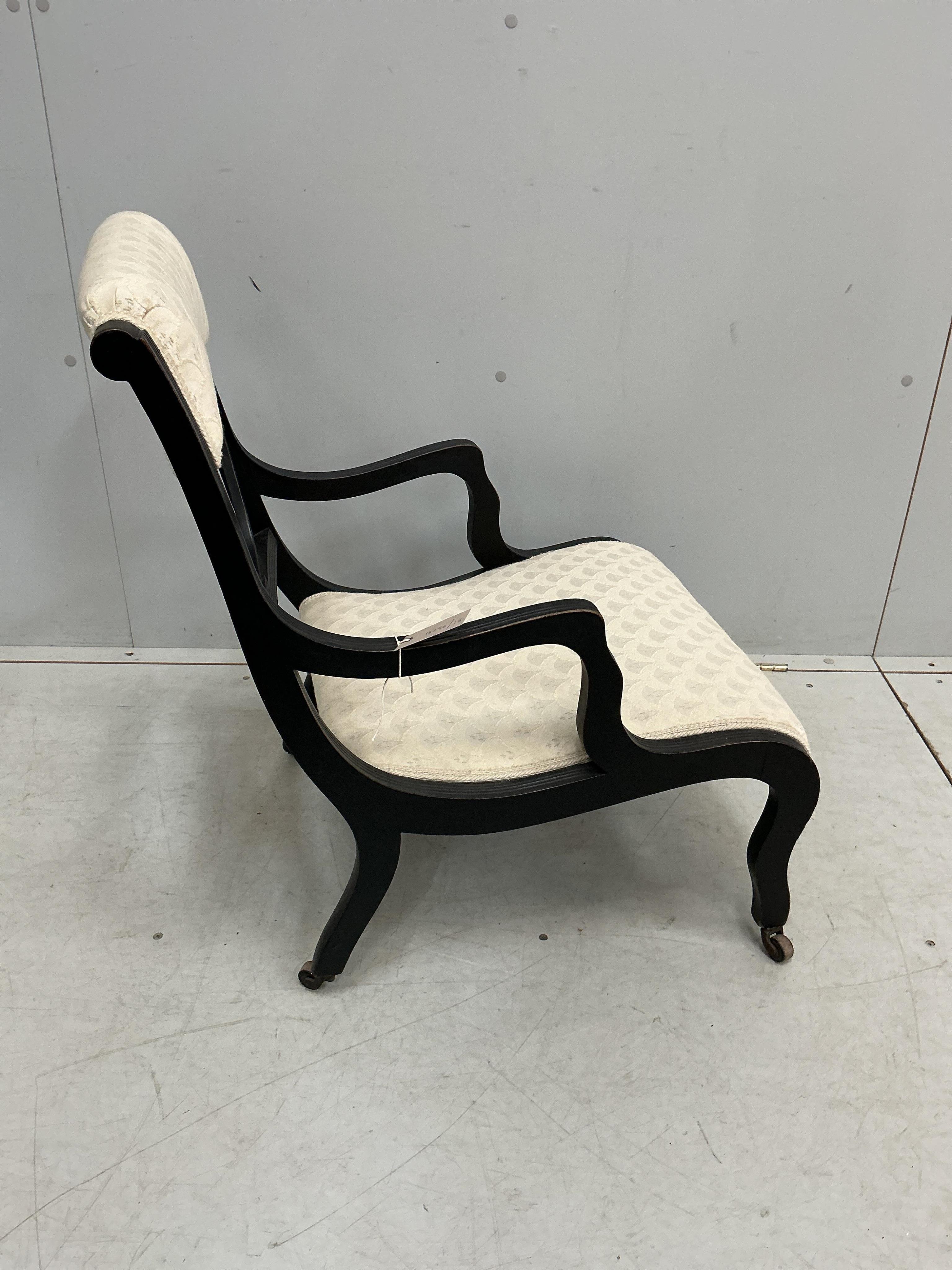 A late Victorian ebonised salon chair, width 47cm, depth 55cm, height 74cm